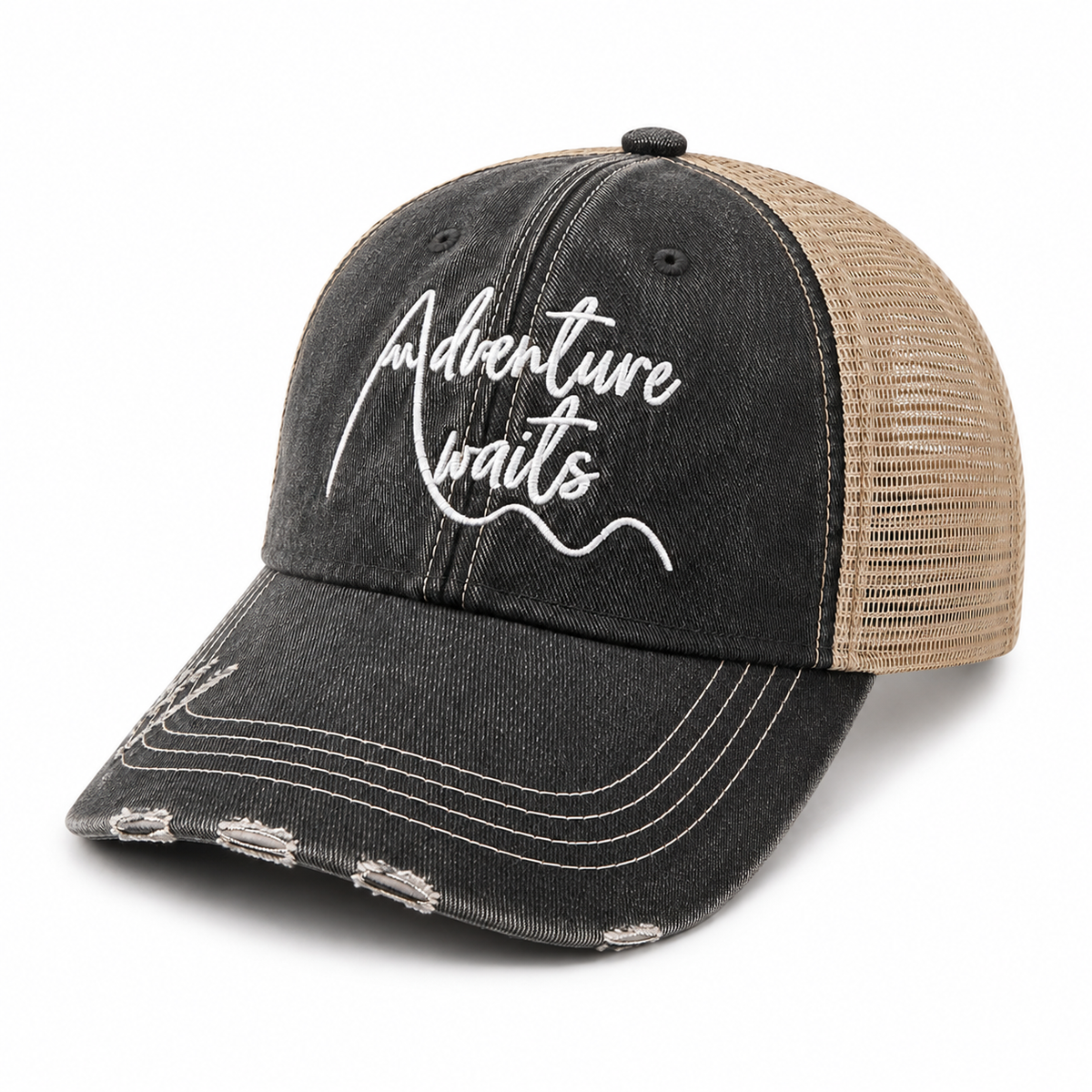 Distressed black Adventure Awaits trucker hat with tan mesh back, angled side view showing distressing on brim
