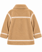 Back view of the tan sherpa jacket showing contrast trim across the shoulders and lower hem
