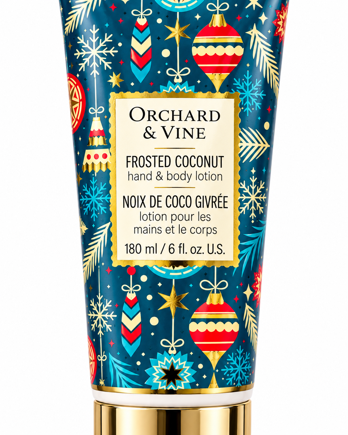 Close-up of the Frosted Coconut hand and body lotion label showing 180 mL and 6 fl oz surrounded by colorful holiday ornaments
