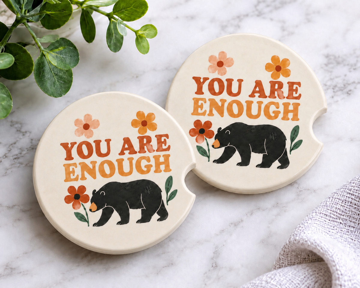 You Are Enough Car Coaster Set — set of 2 ceramic car coasters with black bear and wildflower inspirational design on marble background
