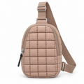 Taupe Quilted Sling Bag front view showing soft taupe puffer nylon with grid square quilted pattern, diagonal main zipper closure with silver hardware and black zipper pull, exterior front zippered pocket, and adjustable taupe woven strap on white background
