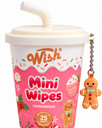 Close-up of the Gingerbread mini wipes cup showing the white straw-shaped lid detail and smiling gingerbread charm on a silver-tone ball chain
