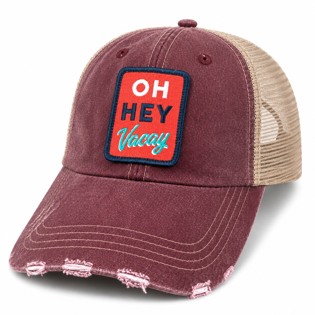 Distressed burgundy trucker hat with beige mesh back and a retro red patch embroidered with Oh Hey Vacay in white, navy, and teal lettering, shown on a white background.
