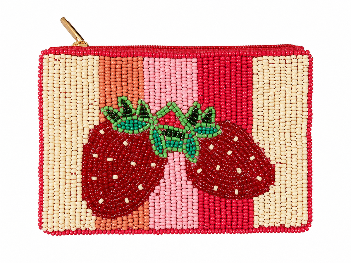 A rectangular beaded pouch with a gold zipper pull, featuring a design of two red strawberries with green leaves on a background of vertical stripes in cream, orange, pink, and red.