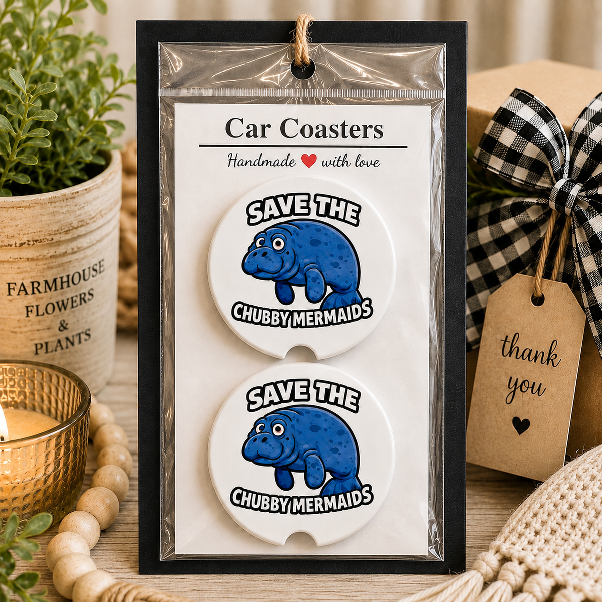 Save the Chubby Mermaids Car Coaster Set (White) in handmade packaging — gift-ready ceramic coasters with cartoon manatee on white background, set of 2
