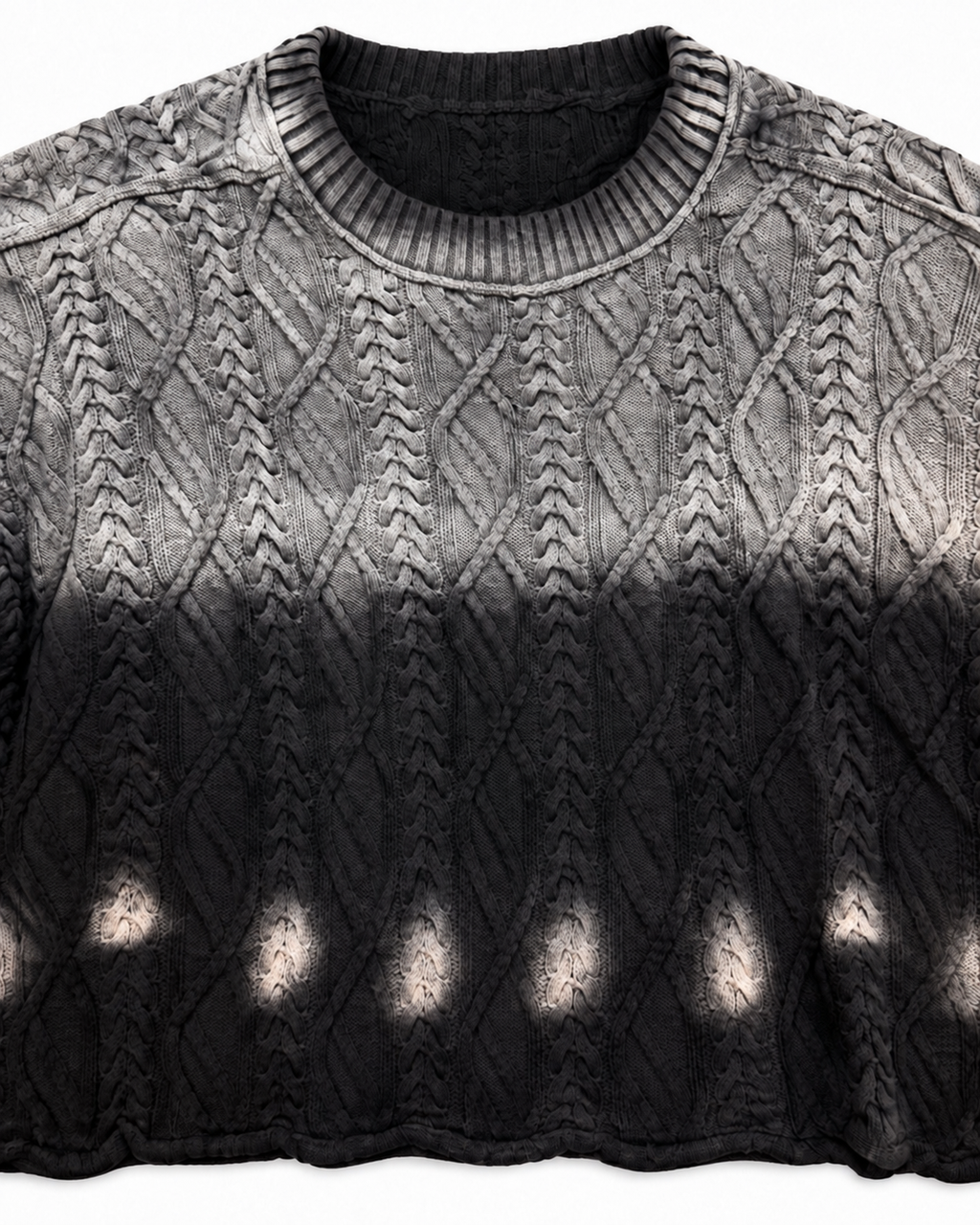 Close-up of crew neckline and textured cable knit pattern on black ombre cropped sweater
