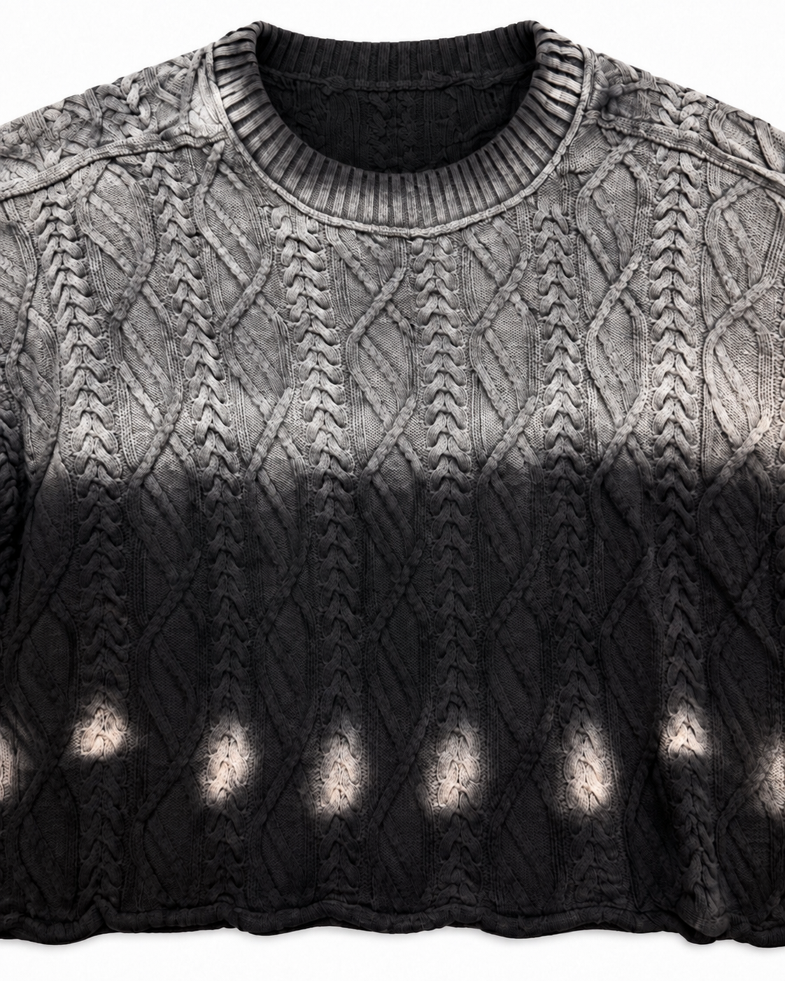 Close-up of crew neckline and textured cable knit pattern on black ombre cropped sweater
