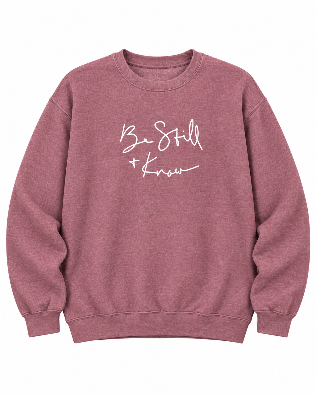 Front view of the dusty mauve Be Still + Know sweatshirt with white script lettering, long sleeves, and ribbed trim
