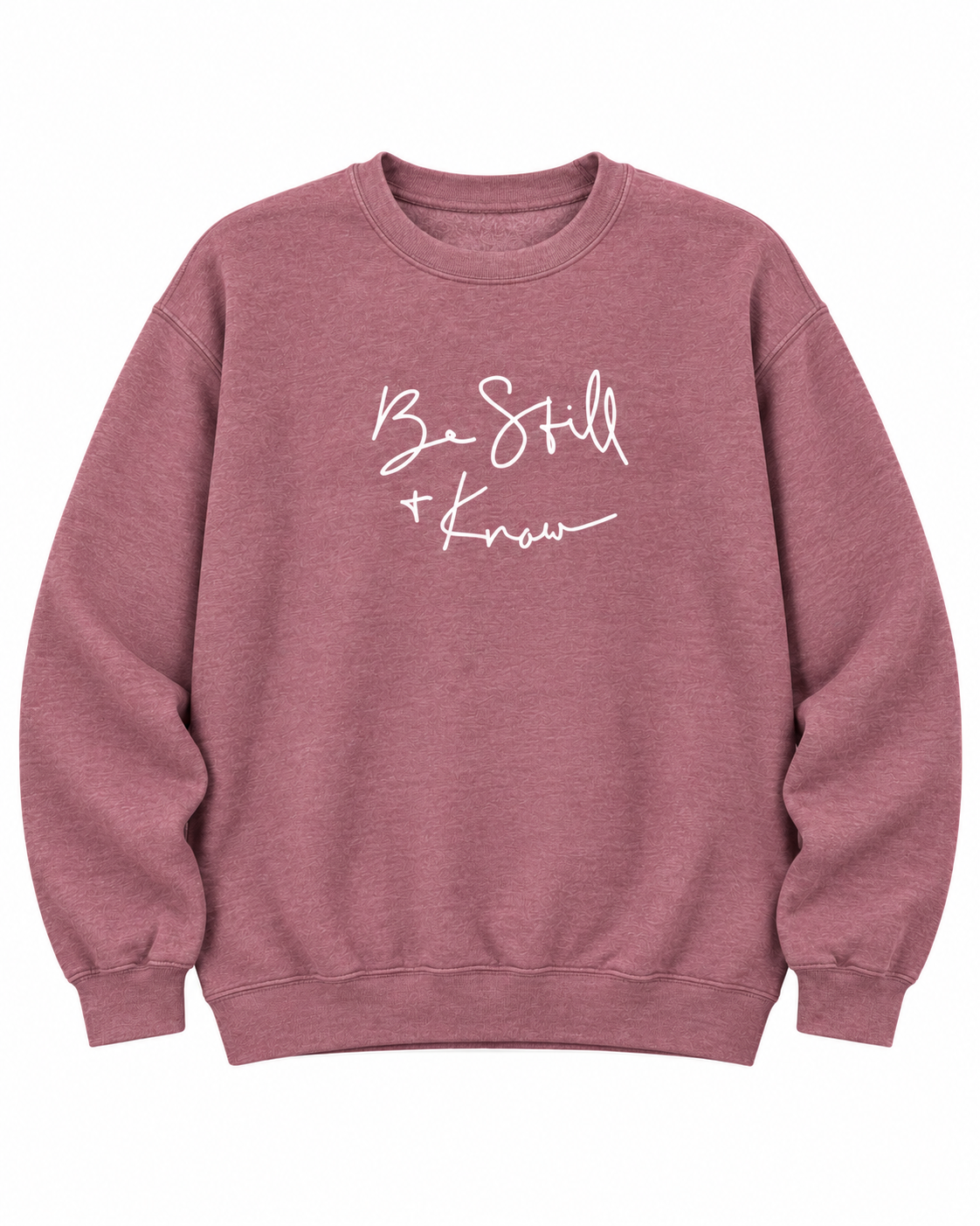 Front view of the dusty mauve Be Still + Know sweatshirt with white script lettering, long sleeves, and ribbed trim

