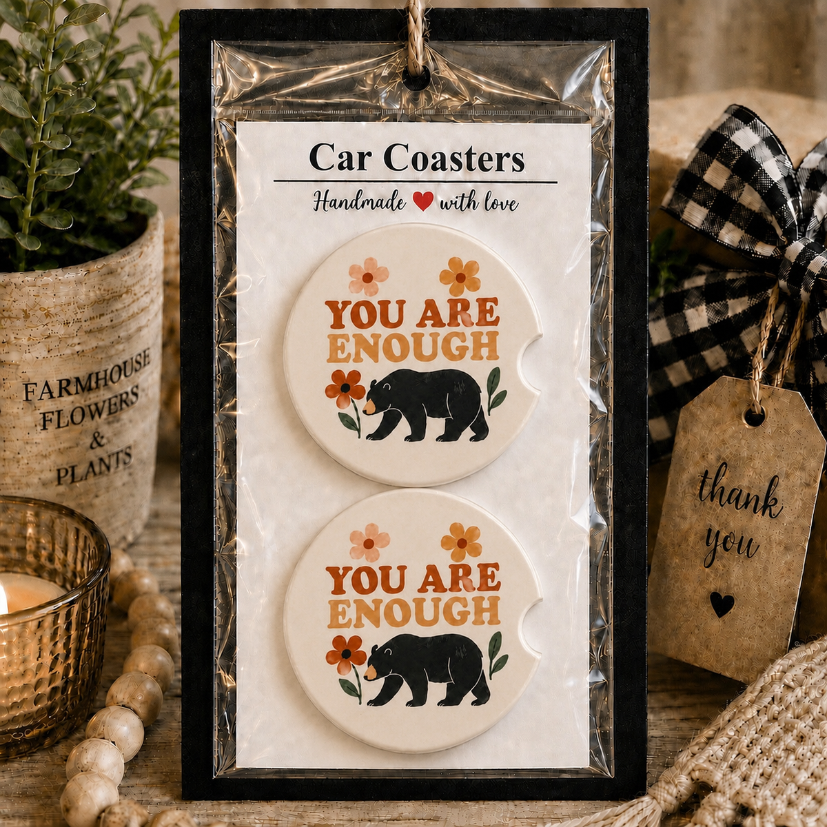 You Are Enough Car Coaster Set in handmade packaging — gift-ready ceramic coasters with black bear and wildflower design, set of 2

