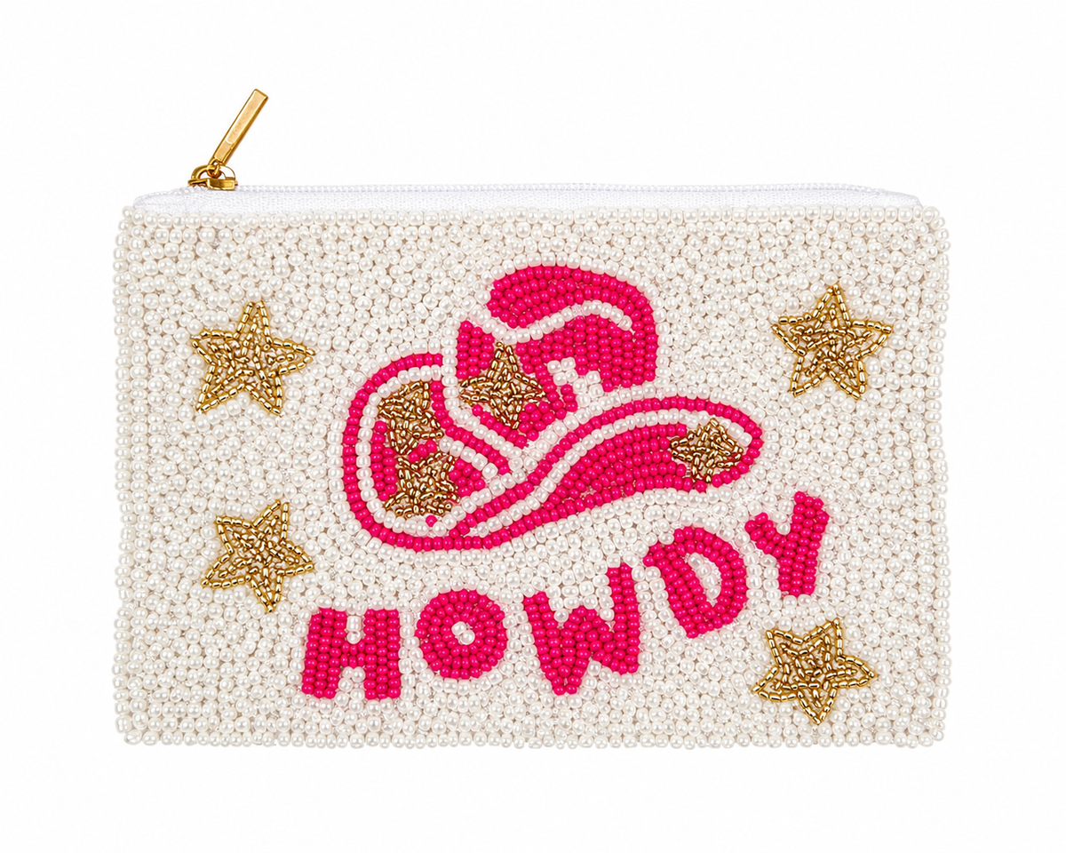 A rectangular white beaded pouch with a gold zipper pull, featuring a pink beaded cowboy hat and the word 'HOWDY' in pink, accented with gold beaded stars on a white background.