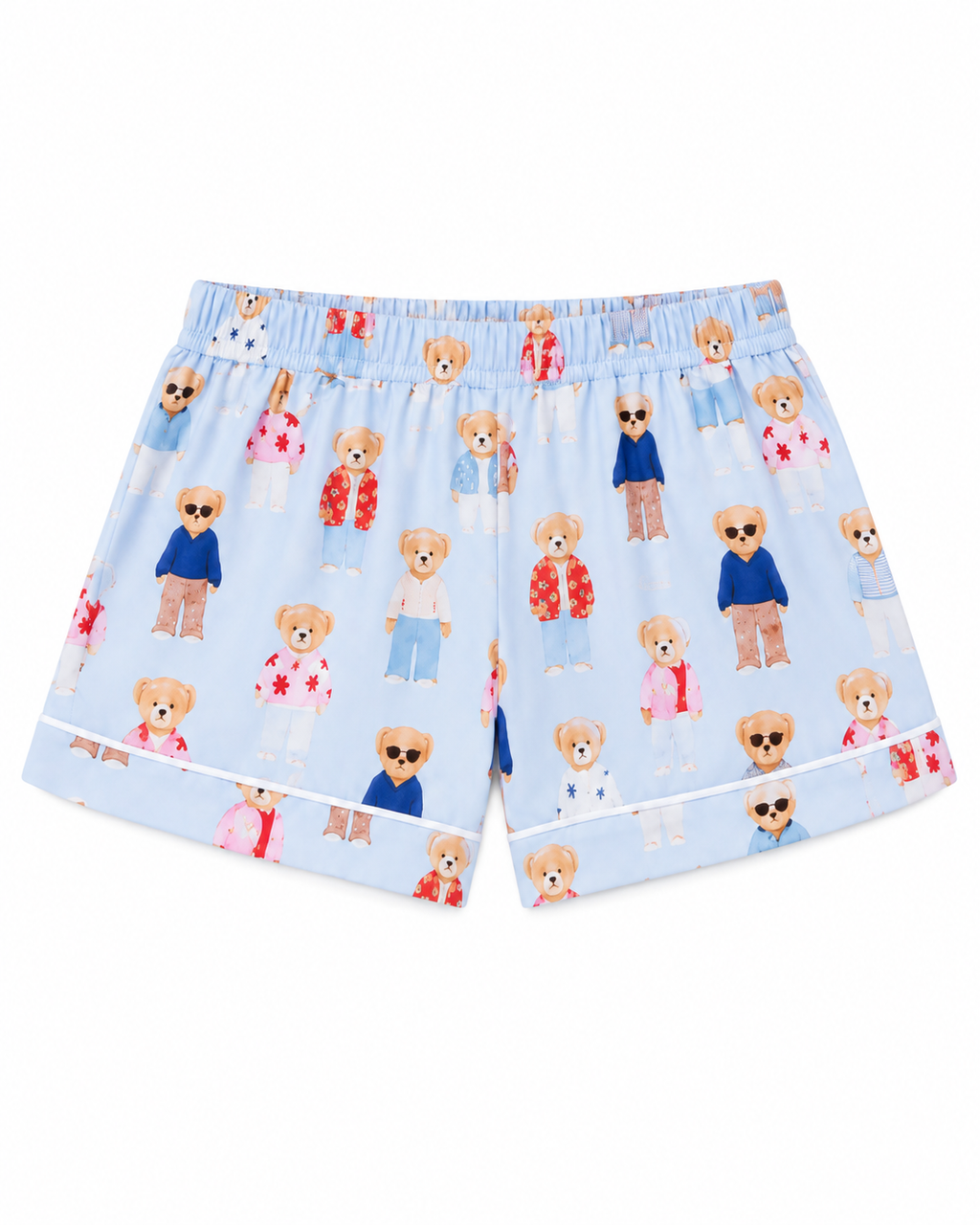 Teddy Bear Pajama Short Set matching shorts flat lay showing light blue fabric with all-over illustrated fashion teddy bear print, elasticized waistband, and white contrast piping along hem on white background
