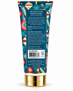 Back of the Frosted Coconut lotion tube showing coconut and vanilla scent details, usage instructions, ingredients, and barcode

