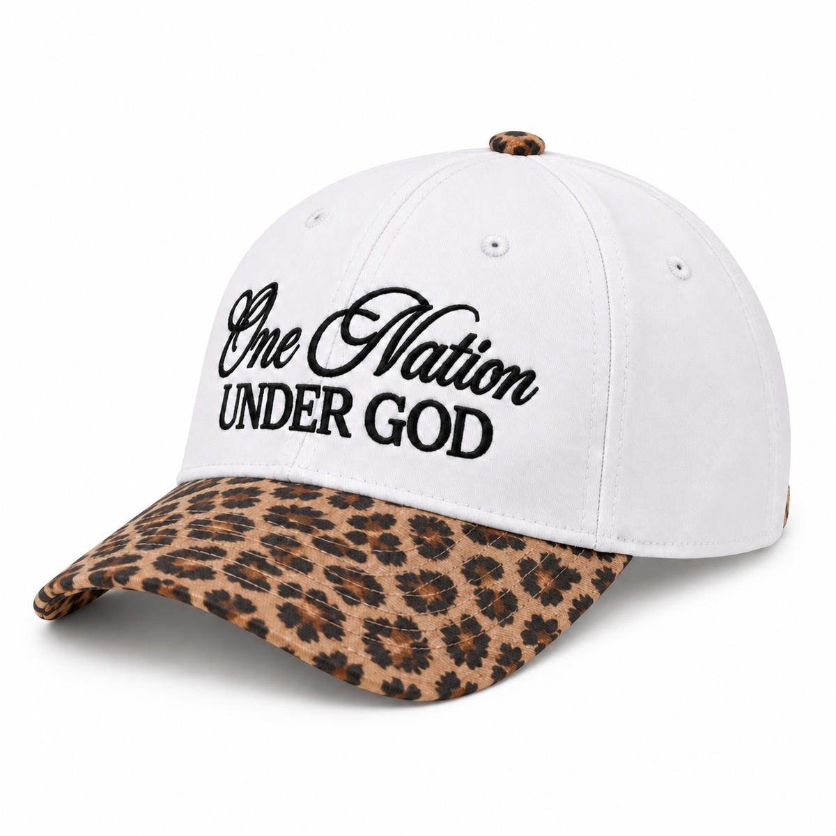 One Nation Under God Baseball Cap in Leopard three-quarter angle view showing white structured six-panel cotton crown with bold black embroidered script, white ventilation eyelets, leopard print top button, and tan and black leopard print bill on white background
