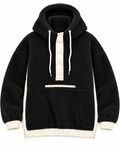 Front view of the black sherpa pullover hoodie showing ivory snap placket, white drawstrings, front zippered pocket, hand pockets, cuffs, and hem
