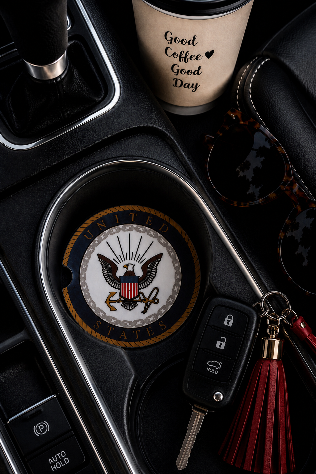 United States Navy ceramic car coaster in cup holder — official U.S. Navy eagle, anchor, and chain seal on navy blue and gold, shown in car console with coffee cup and key fob
