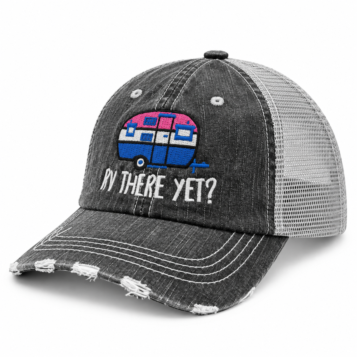 RV There Yet Trucker Hat three-quarter angle view showing distressed black front, gray mesh back, and embroidered pink and blue camper graphic with white RV There Yet lettering on white background
