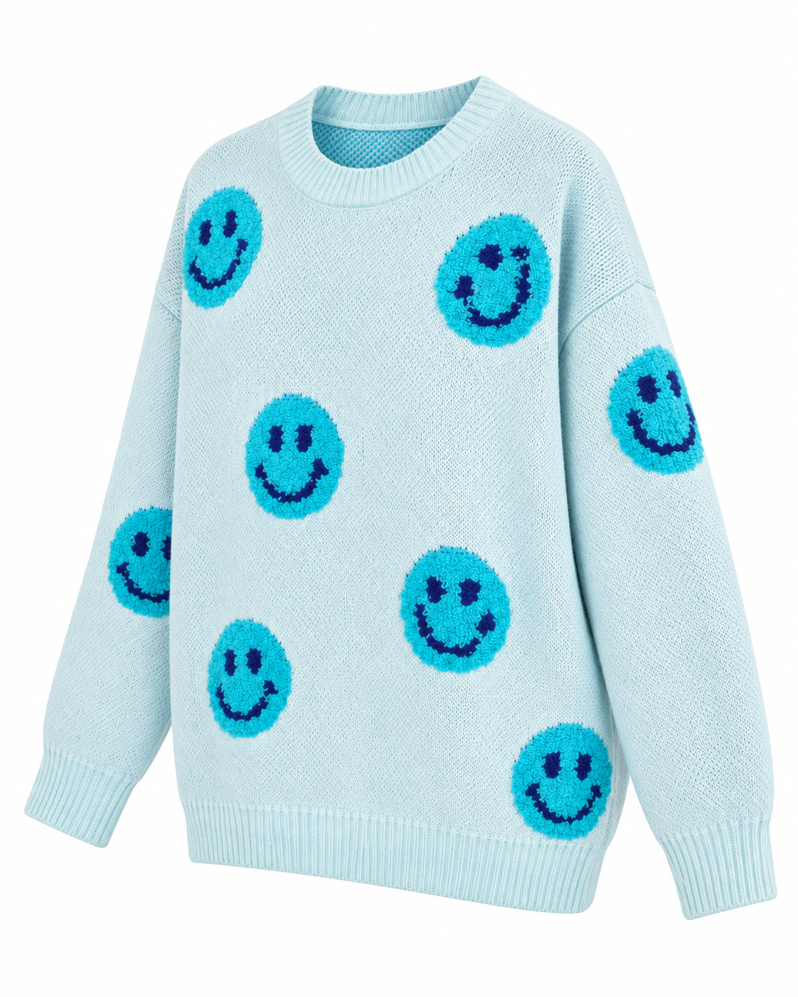 Angled front view of the light blue happy face sweater showing textured turquoise smileys, dropped shoulders, and long sleeves
