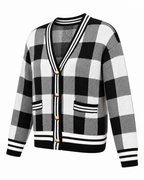 Black and White Plaid Gold Button Knit Cardigan three-quarter angle view showing black, white, and gray plaid pattern, V-neck with striped trim, gold dome buttons, front patch pockets, and striped ribbed hem and cuffs on white background
