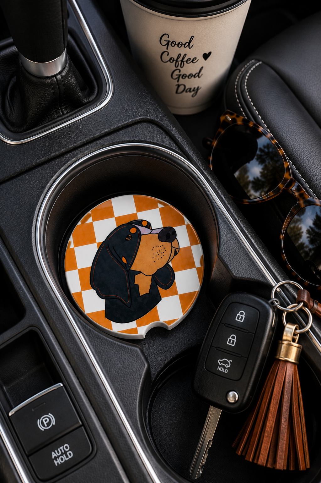 Smokey Checkerboard ceramic car coaster in vehicle cup holder
