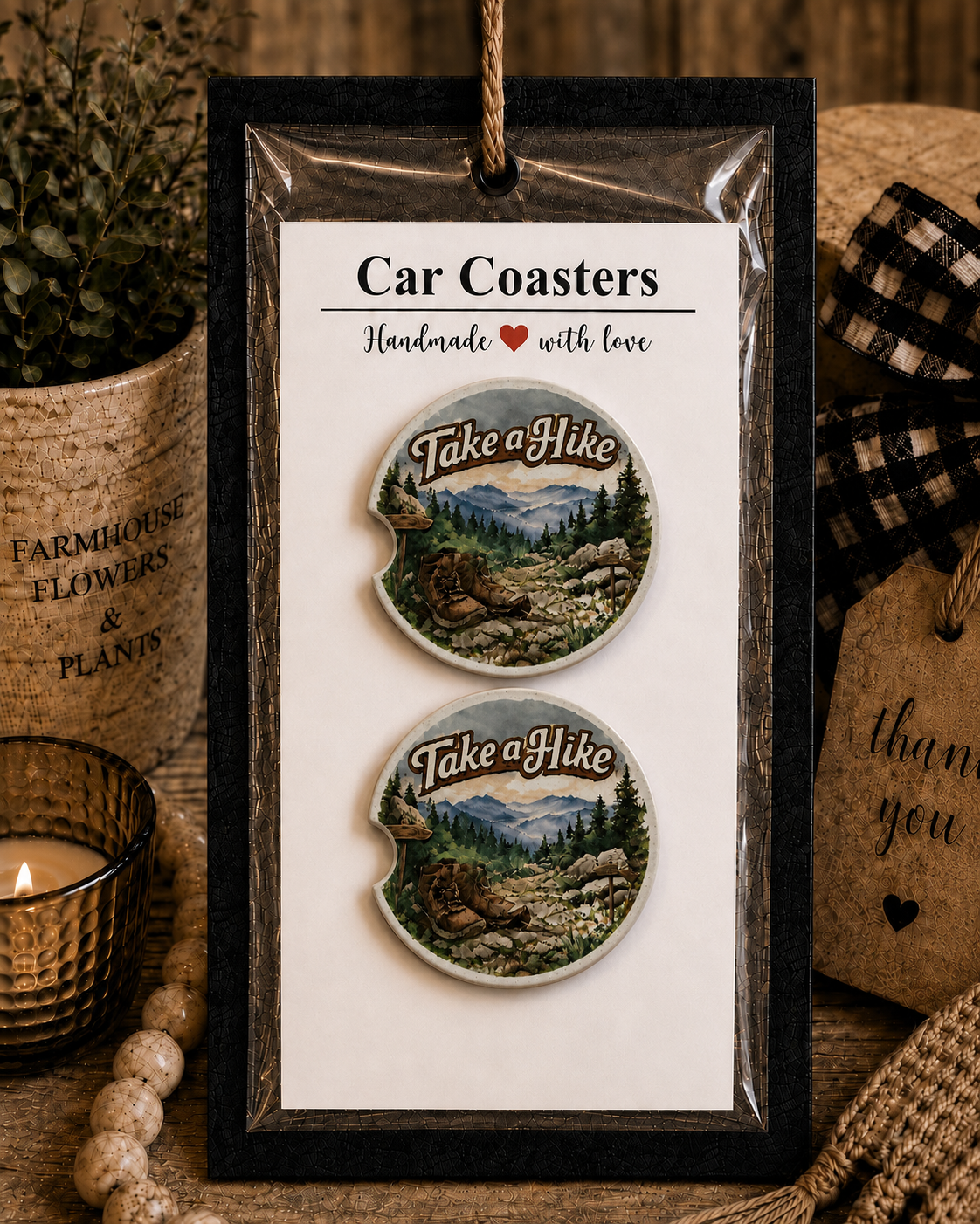 Take a Hike Car Coaster Set in handmade packaging — gift-ready ceramic coasters with watercolor mountain trail, hiking boots, pine trees, and Take a Hike lettering, set of 2
