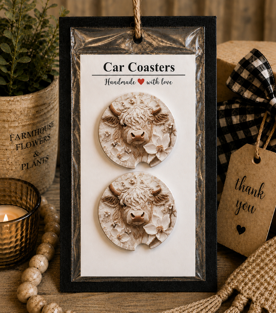 Highland Cow Floral Car Coaster Set in handmade packaging — gift-ready ceramic coasters with sculpted cream ivory Highland cow and dogwood floral design, set of 2
