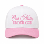 One Nation Under God Baseball Cap in Pink front view showing white structured cotton crown with pink embroidered script reading One Nation Under God in cursive and block lettering, light pink bill, and pink top button on white background
