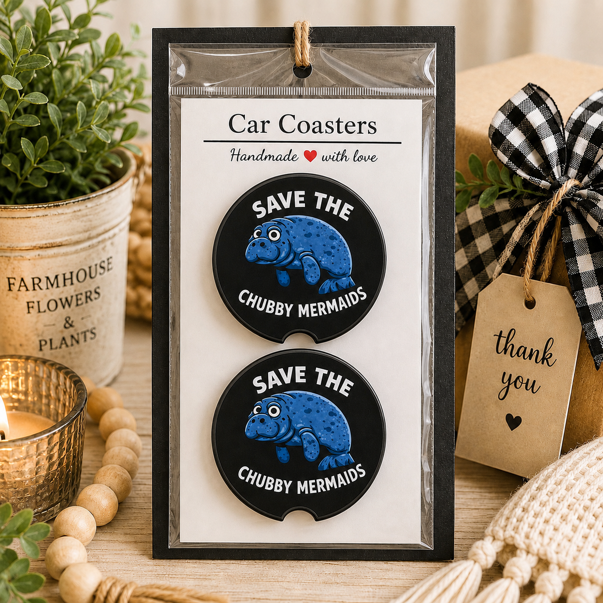 Save the Chubby Mermaids Car Coaster Set (Black) in handmade packaging — gift-ready ceramic coasters with cartoon manatee on black background, set of 2

