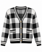 Black and White Plaid Gold Button Knit Cardigan front view showing black, white, and gray buffalo plaid pattern, V-neck with black and white striped knit trim, antique gold dome buttons, two front patch pockets with striped trim, and striped ribbed hem and cuffs on white background
