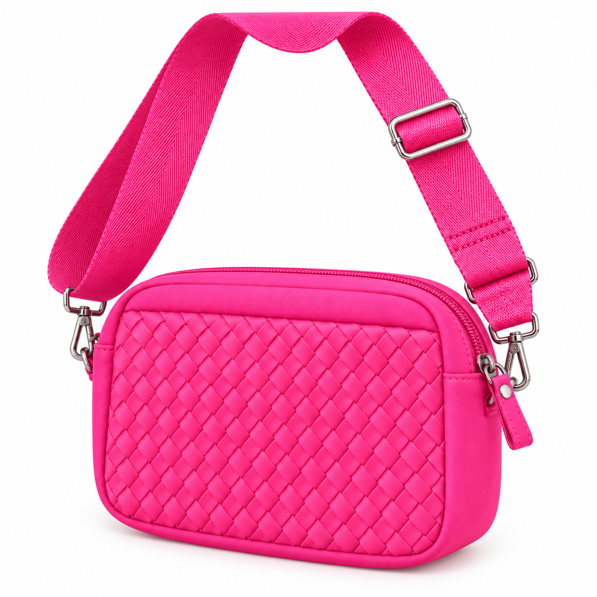 Hot Pink Woven Crossbody Bag three-quarter angle view showing vivid hot pink quilted diamond woven panel, smooth pink trim, top zipper closure with silver pull, and adjustable wide hot pink webbing strap with silver swivel clips on white background

