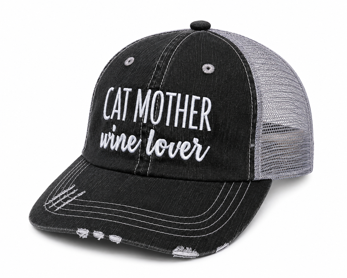Side view of Cat Mother Wine Lover trucker hat in distressed black with gray mesh back and white embroidered lettering, shown on a white background.

