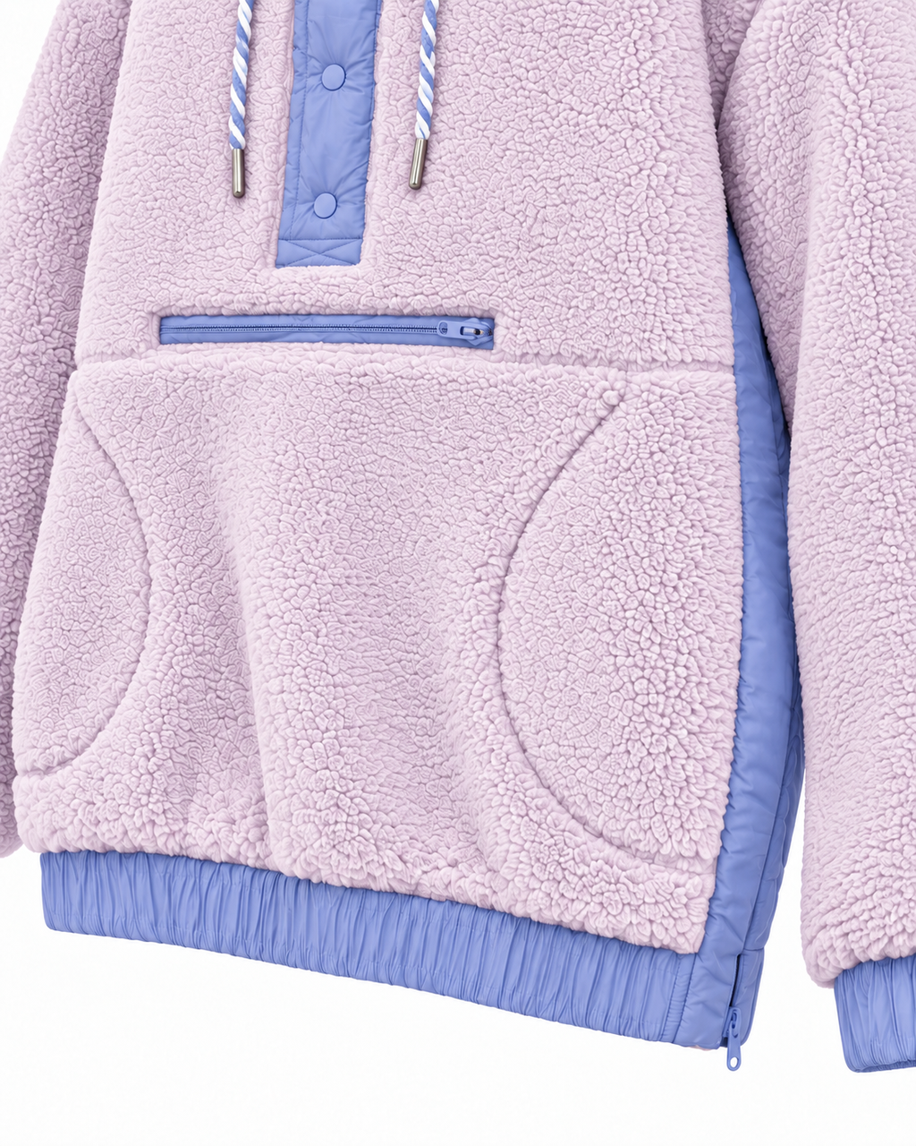 Close-up of the light purple sherpa hoodie showing the front zipper, curved hand-pocket openings, and periwinkle blue side panel and hem
