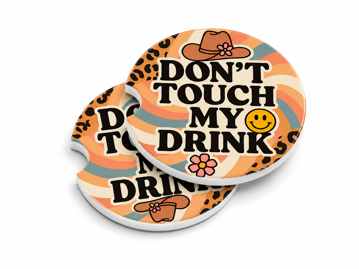Don't Touch My Drink ceramic car coasters stacked showing thickness and finger notch cutout, retro rainbow and leopard print design, set of 2
