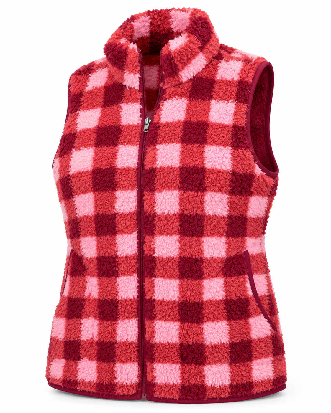 Angled front view of the pink, coral, and burgundy plaid sherpa vest showing its zipper, side pocket, and sleeveless design
