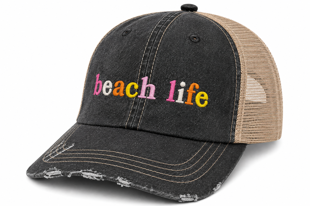 Side view of Beach Life trucker hat in distressed black with tan mesh back and multicolor embroidered lettering, shown on a white background.
