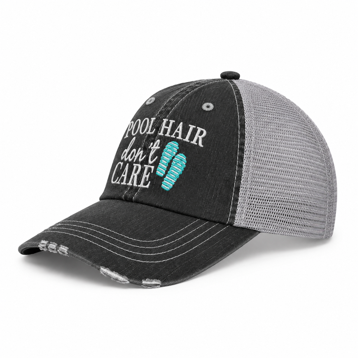 Side view of Pool Hair Don't Care trucker hat in washed black with light gray mesh back and embroidered lettering, shown on a white background.
