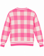 Back view of Pink Plaid Gold Button Knit Cardigan showing pink and white plaid knit back panel with striped ribbed hem and ribbed cuffs on white background
