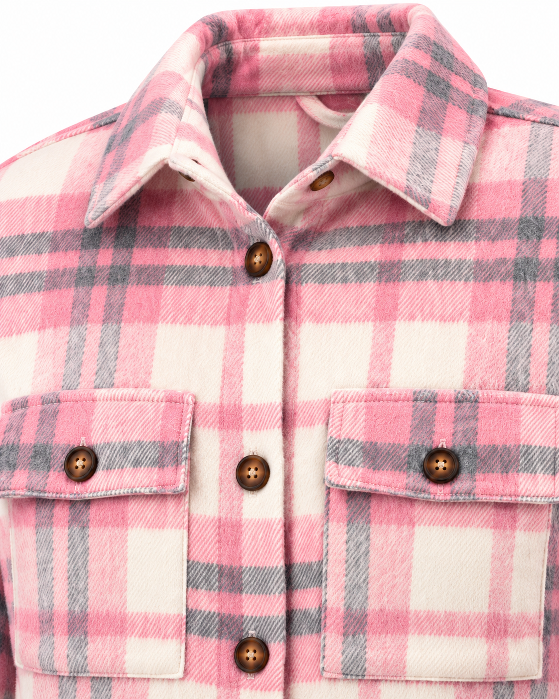 Close-up of Pink & Gray Plaid Shacket showing spread collar, brown dome buttons along button placket, and two buttoned chest flap pockets on pink, gray, and cream plaid on white background
