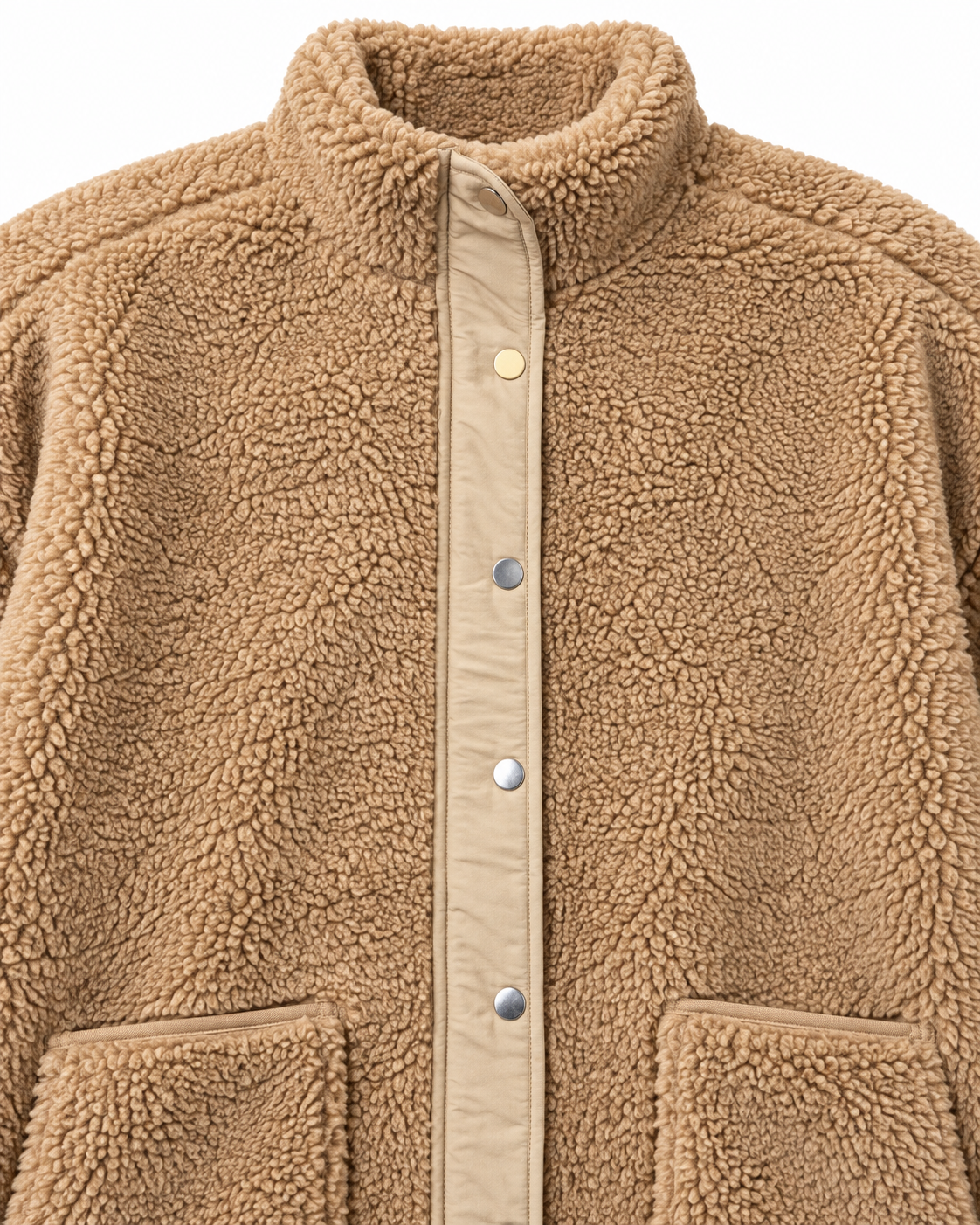 Close-up of the camel sherpa jacket showing its stand-up collar, smooth lighter tan placket, metal snaps, and pocket trim
