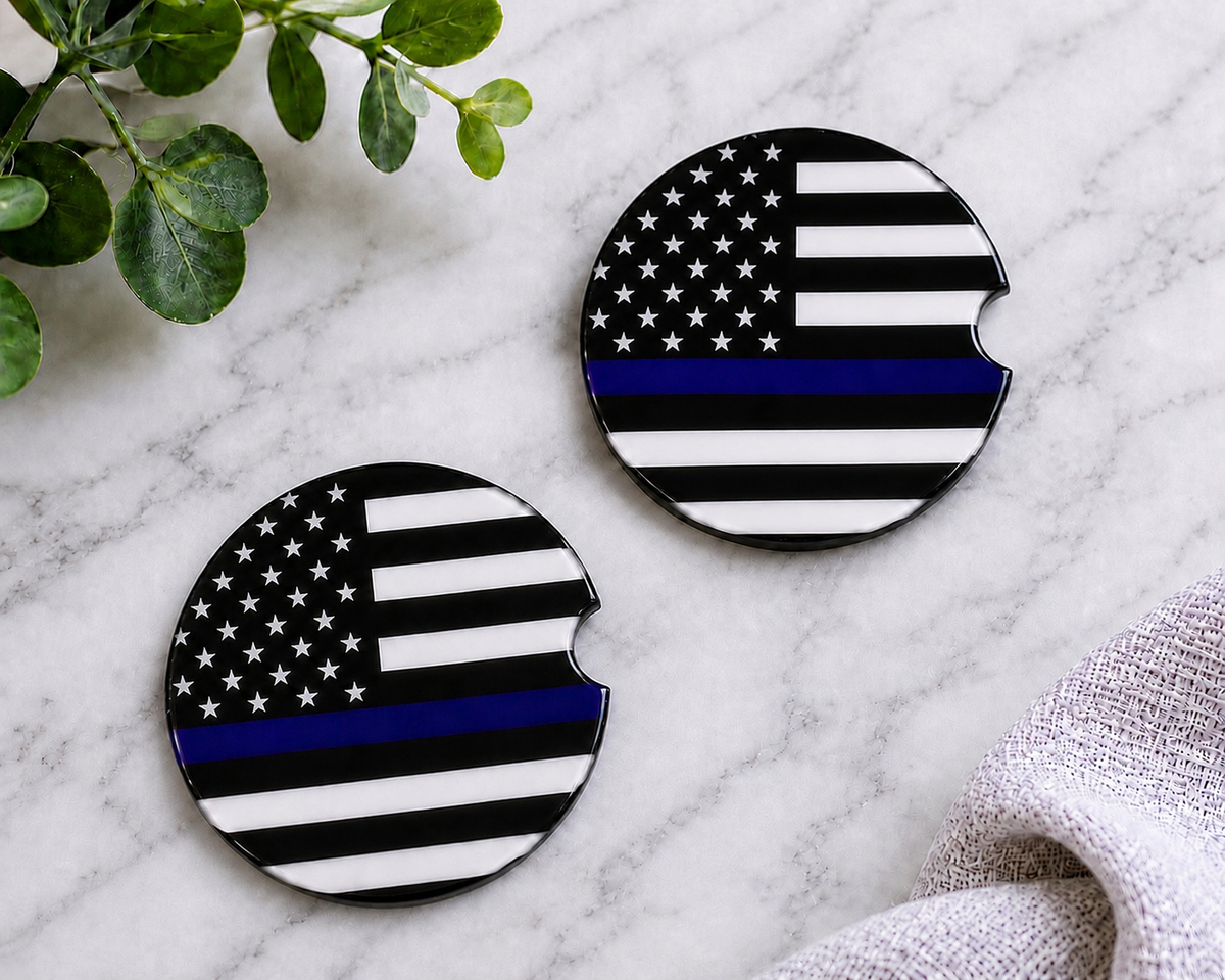Thin Blue Line Car Coaster Set — set of 2 ceramic car coasters with black and white American flag and thin blue line design on marble background
