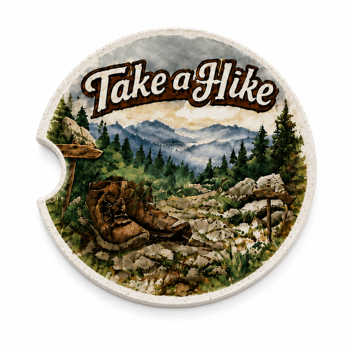 Close-up of Take a Hike ceramic car coaster with watercolor mountain trail scene — hiking boots, pine trees, rocky path, trail signs, and misty blue mountains on white
