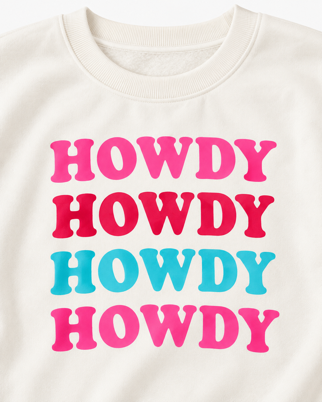 Close-up of four colorful HOWDY graphics and the ribbed crew neckline on the cream sweatshirt
