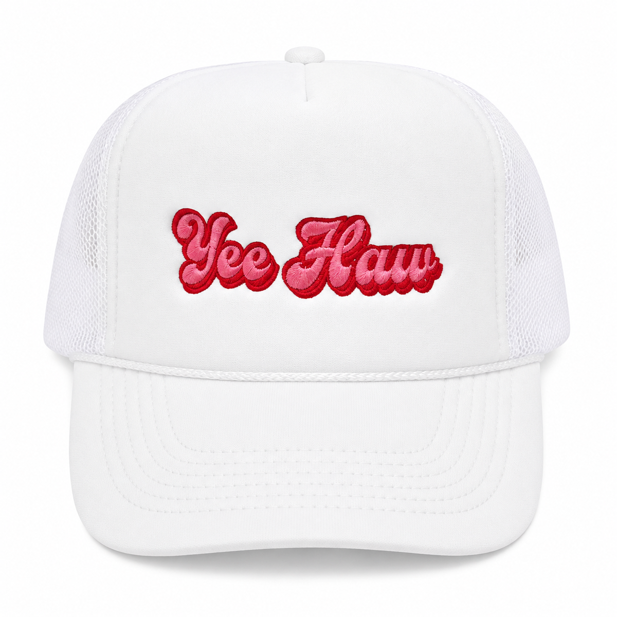 White trucker hat with pink and red Yee Haw retro script embroidery, front view
