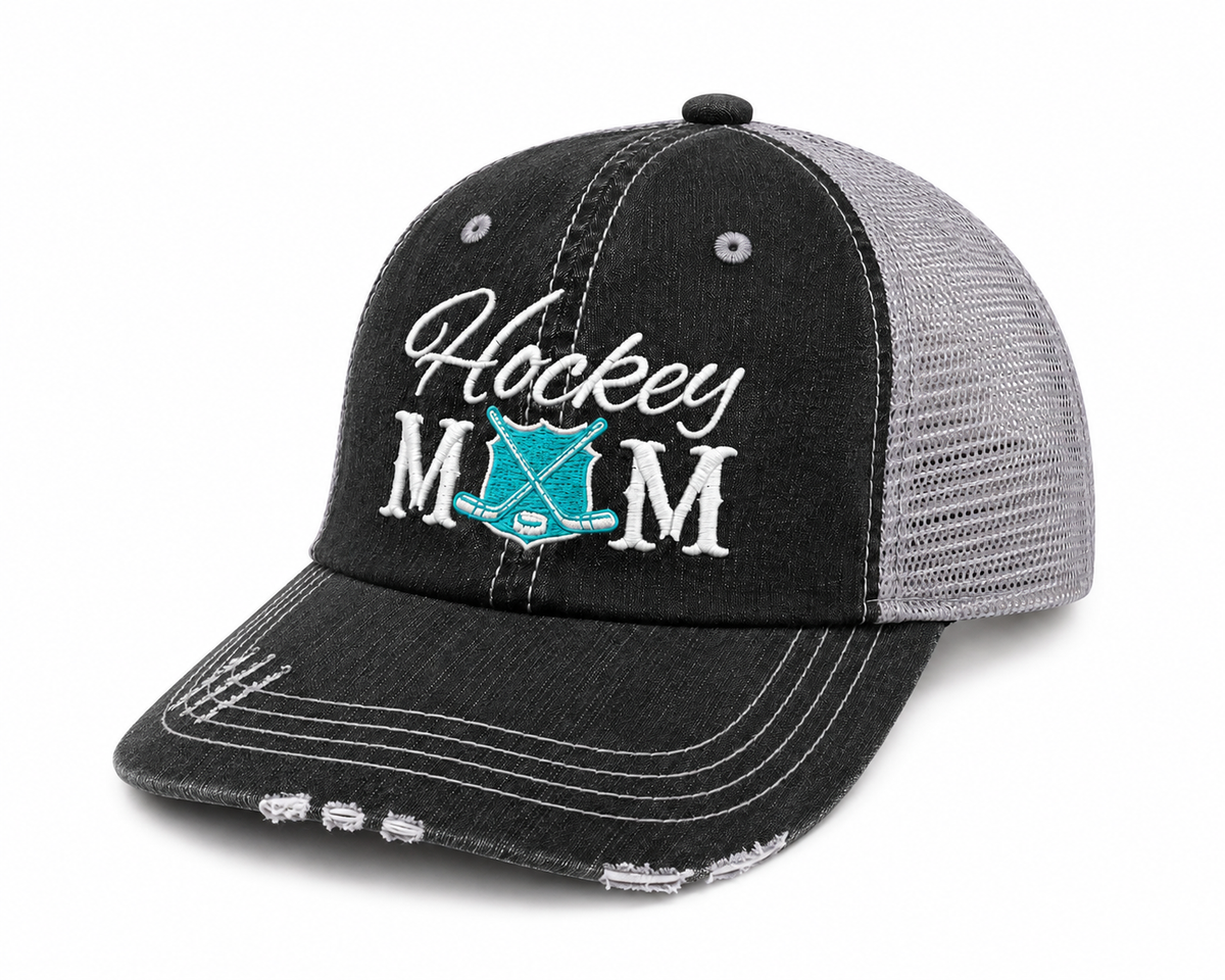Side view of Hockey Mom trucker hat in distressed black with gray mesh back and white embroidered lettering, shown on a white background.
