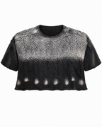 Front flat lay of black ombre cable knit cropped sweater with distressed hem detail on white background
