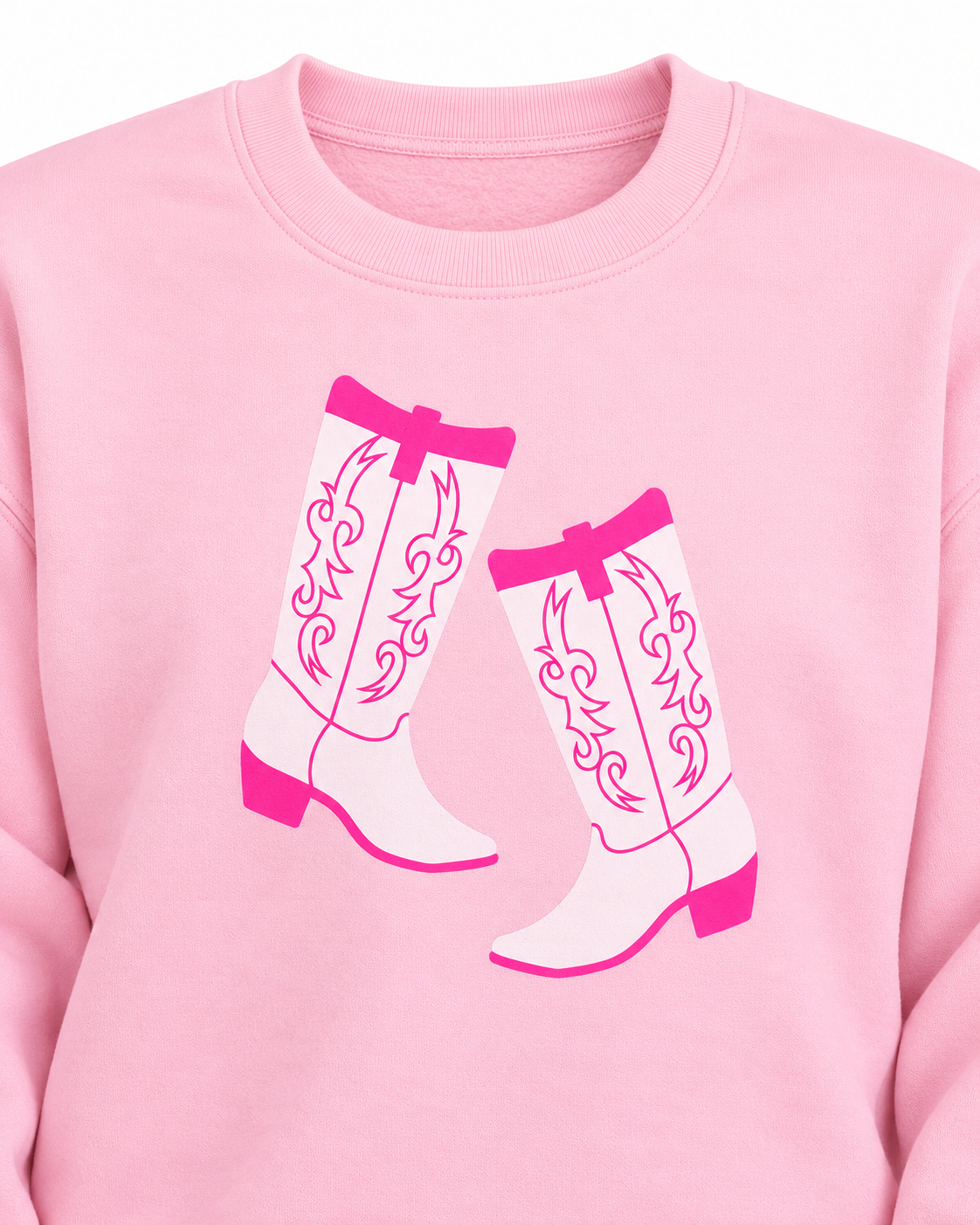 Close-up of the white cowboy boot graphic with hot pink detailing and the ribbed neckline on the pink sweatshirt

