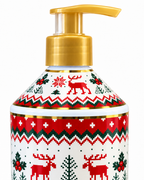 Close-up of the gold-colored pump and bottle shoulder decorated with red reindeer, green trees, holly berries, snowflakes, and zigzag borders
