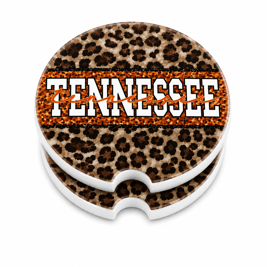 Tennessee Leopard ceramic car coasters stacked showing thickness and finger notch cutout — leopard print with bold orange Tennessee lettering, set of 2
