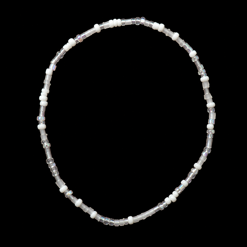 White and iridescent seed bead stretch bracelet with clear bugle beads and crystal rondelles displayed flat in a circle on black background
