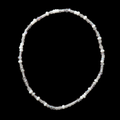 White and iridescent seed bead stretch bracelet with clear bugle beads and crystal rondelles displayed flat in a circle on black background
